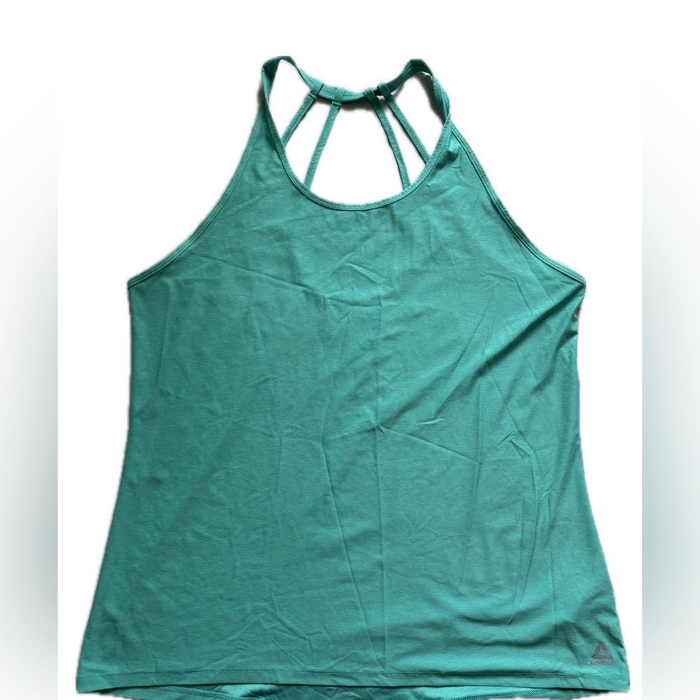 Reebok workout tank top with detailing on back. Size XL